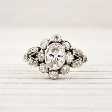 Vintage 1.5Ct Oval Cut CZ Unique Halo Wedding Engagement Ring in 925 Silver