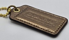 Coach Metallic Gold Bronze Logo Hang Tag Brass Ball Chain Bag Charm Excellent