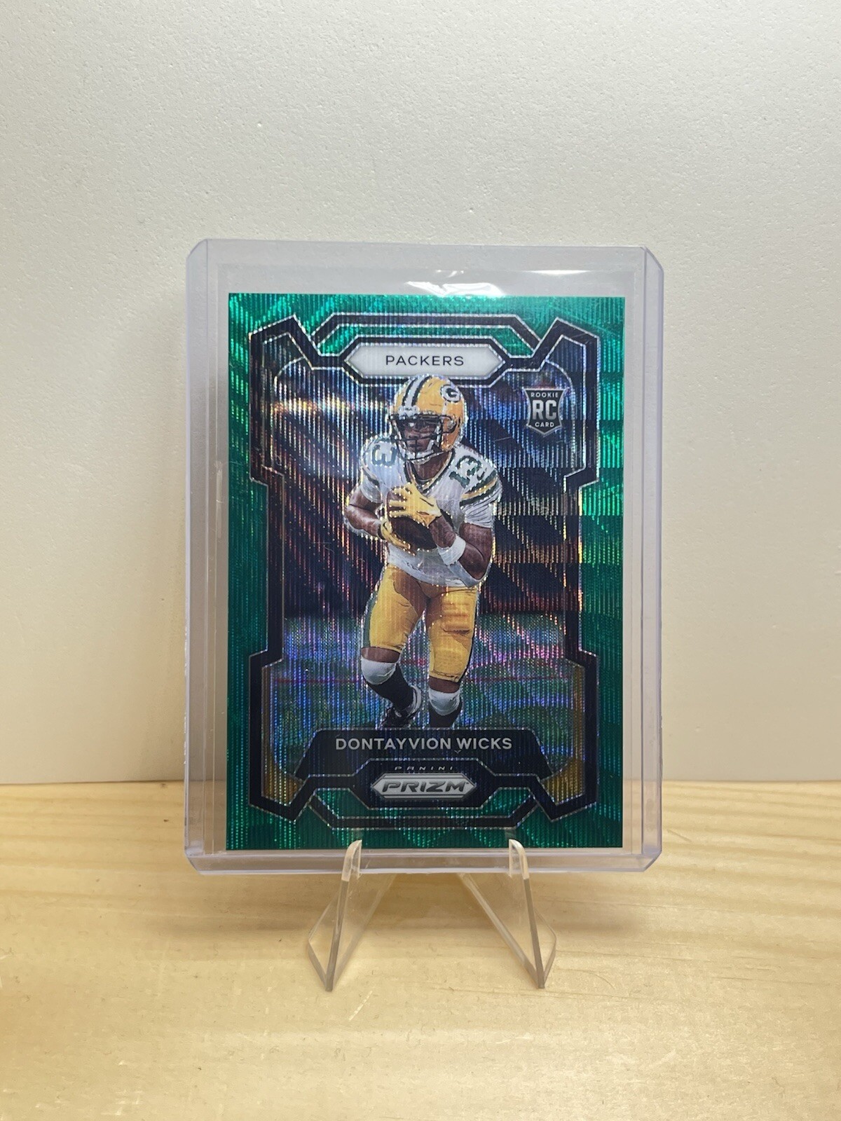 2023 Panini Prizm - Rookies Green Wave Prizm #333 Dontayvion Wicks (RC)