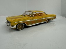 Scala 1:18 Malibu International 1961 Chevrolet Impala Lowrider giallo raro.