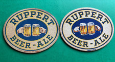 2 DIFFERENT VINTAGE JACOB RUPPERT BEER HANDS & MUGS COASTERS NEW YORK