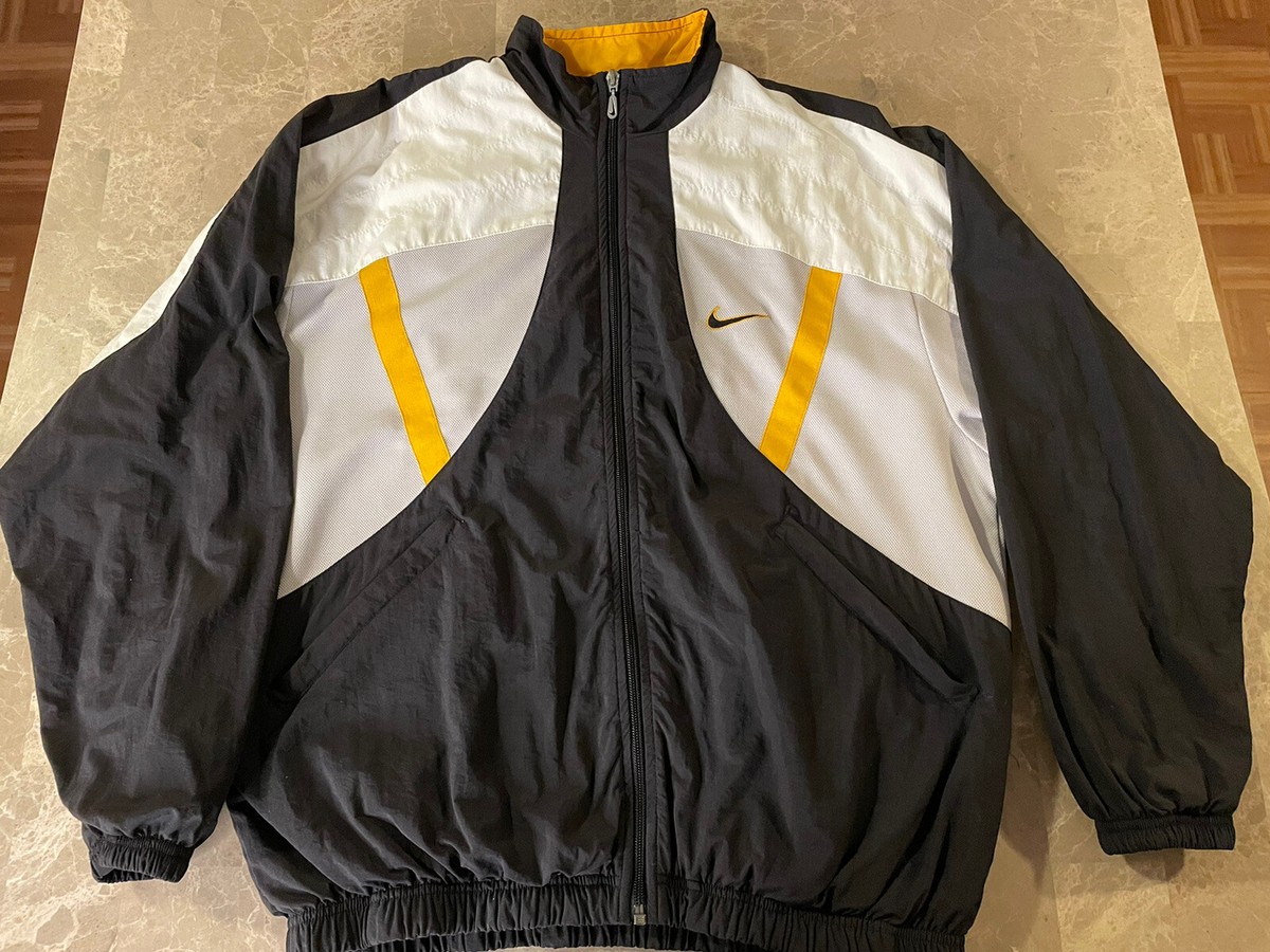 yellow black and white nike windbreaker