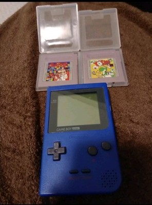 Game Boy Pocket Blue Handheld Working With Yoshi And Dr. Mario Cartridges