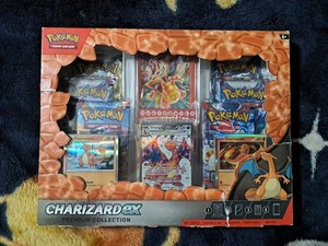 pokemon charizard celebrations card Amazon.com: Pokemon TCG: Charizard ex Premium Collection : Toys & Games main image 1