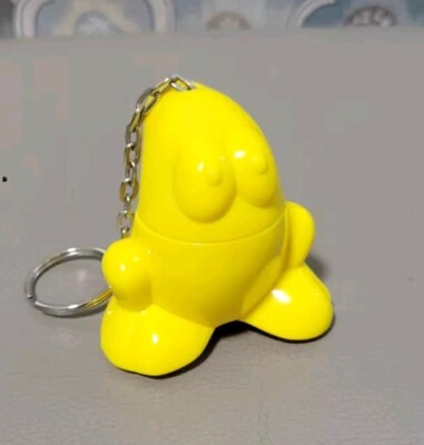 Vintage 1990s Crazy Bones Keychain Eggy Yellow Plastic Character