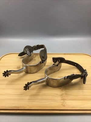 Pair Of Crockett Style stainless Steel Western Spurs With Leather Straps