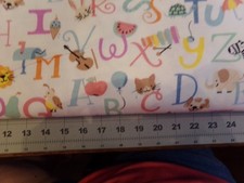 cotton flannel fabric alphabet with pictures on white 42" wide by the 1/2 yard