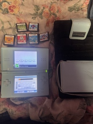 Teal Nintendo DS Lite, Stylus, Charger and 6 Games￼