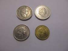 4 x Switzerland: 5 centimes 1985, 10 centimes 1978 and 2 x 20 centimes 1939 and 1991