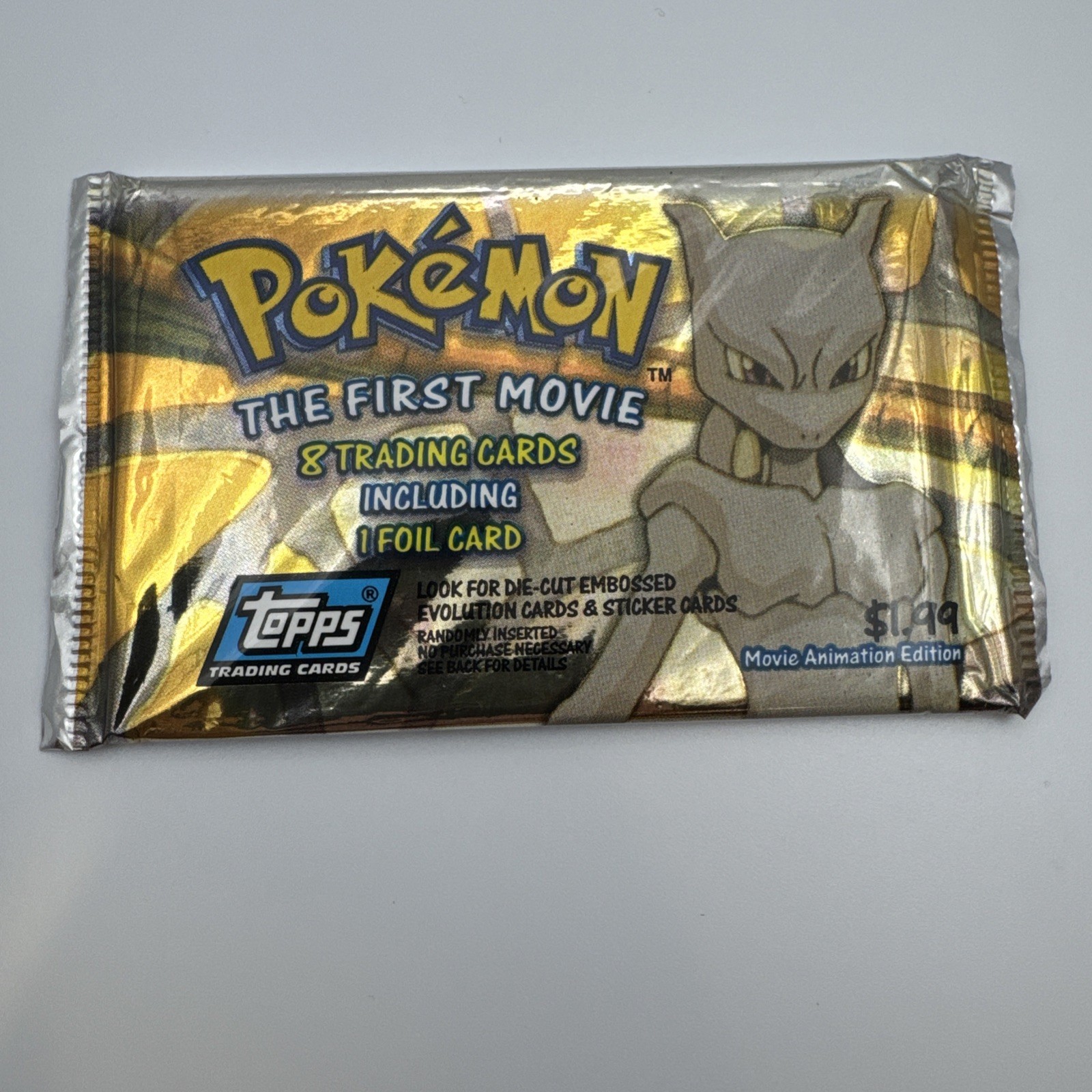 1999 Topps Pokémon The First Movie Sealed Booster Pack – 8 Cards 1 Foil