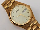 Vintage Golden Seiko 5 Quartz Day-Date Luminous Dial Men's Japanese Watch