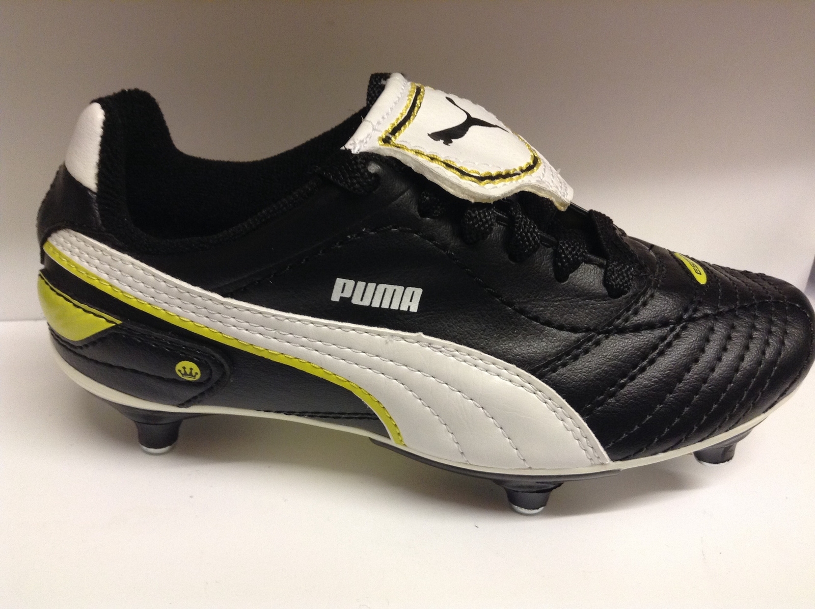 yellow junior football boots