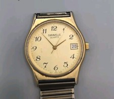 Bulova Caravelle 42822 Calendar Date Gold Tone Quartz Watch FOR PARTS OR REPAIR