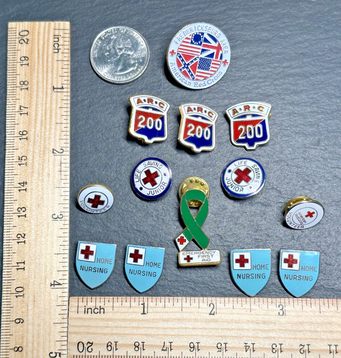 14 AMERICAN RED CROSS PINS : 200, HOME NURSING, LIFE SAVING JR+ H659