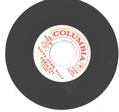 DORIS DAY--7'-PROMO 45--(WHAT DOES A WOMAN DO/DAFFA DOWN DILLY