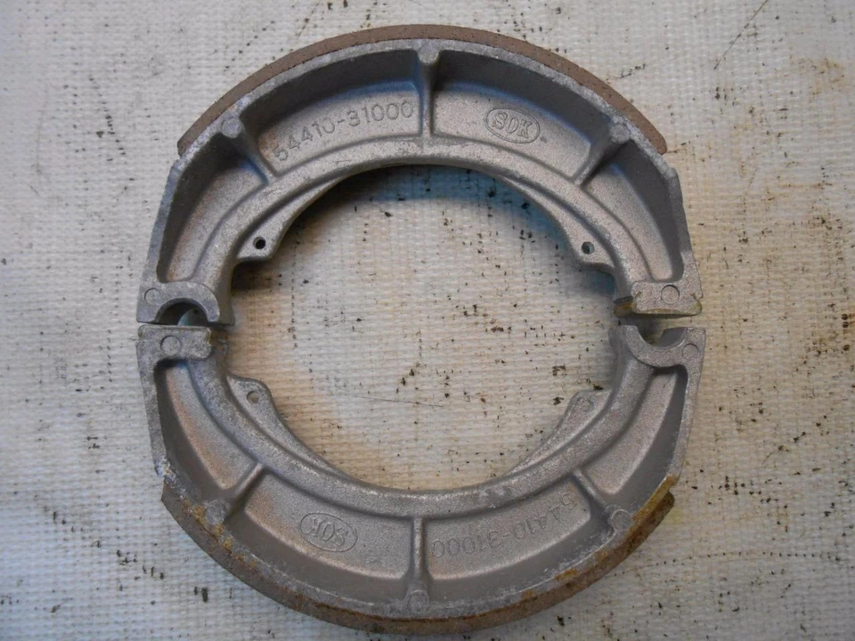 ZAPATAS FRENO EMGO SUZUKI 92-41007 BUJE RUEDA TRASERA GT750 RE5 GS750 64410-31000 NOS Foto 3 de 4