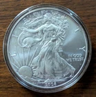 2008 AMERICAN SILVER EAGLE BULLION, 1 oz  .999 SILVER in hard plastic capsule