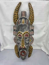 A Senufo Kpelie One-of-a-Kind Legacy Wood Tribal Mask hand carved