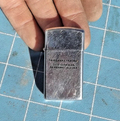 Vintage 1976 Fairbanks TBA Inc Fairbanks Alaska Slim Zippo Lighter S.S.