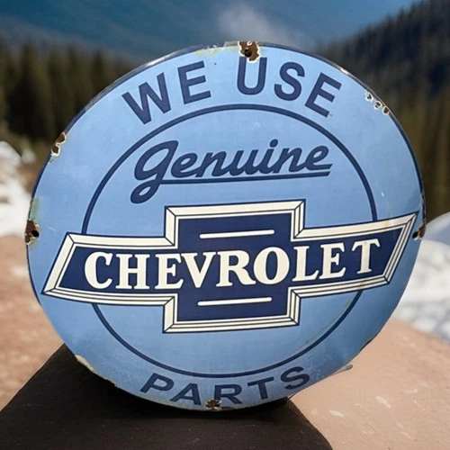 VINTAGE 12” WE USE GENUINE CHEVROLET PARTS  CONVEX PORCELAIN ENAMEL DEALER SIGN