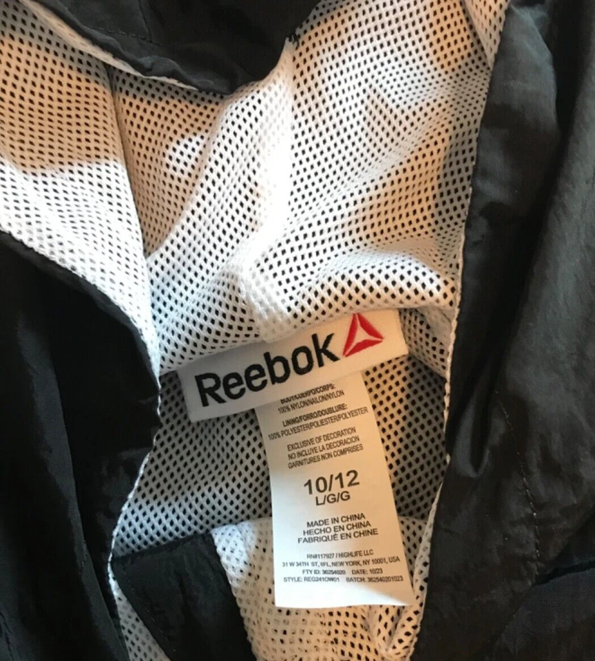 REEBOK ROMPEVIENTOS NUEVO CON CAPUCHA NIÑAS TALLA L 10-12 NEGRO NUEVO CON ETIQUETAS COSTABA $20 Foto 2 de 4