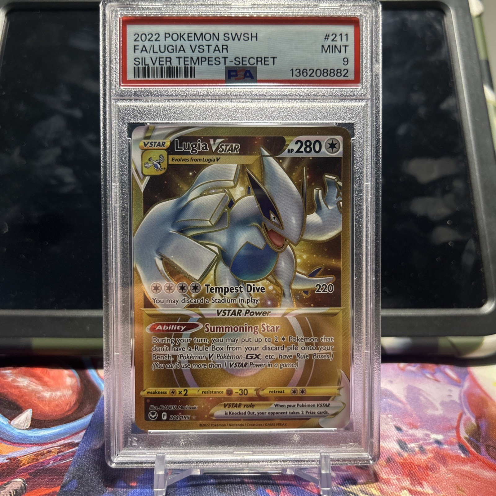 Pokémon TCG Silver Tempest Lugia VSTAR Card 211/195 Gold Secret Rare PSA 9