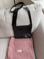 Vintage Radley London black leather crossbody bag with pink dust bag.