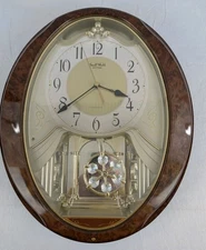 Rhythm Small World Clock with Melodies & Crystal Snowflake Pendulum READ