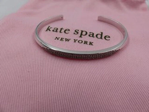 BRACCIALE PAVÈ KATE SPADE NEW YORK ALZA LA BARRA WBRUH556 TRASPARENTE ARGENTO