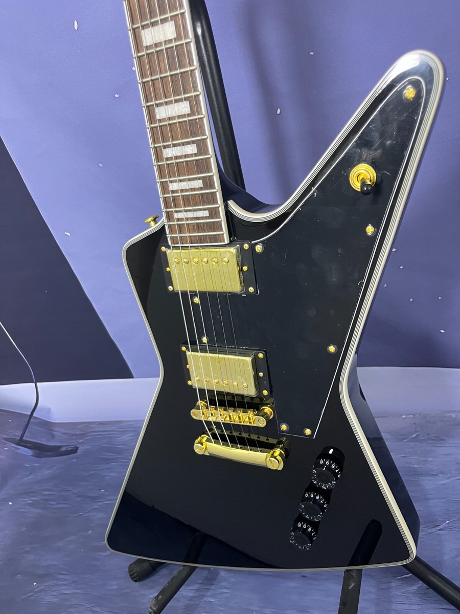 Factory custom Electric guitar black color explorer Gold