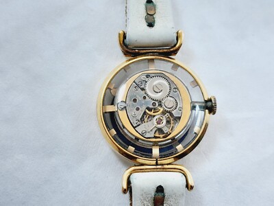 VINTAGE JUVENIA 17 JEWELS HAND WINDING SKELETON DIAL GOLD  display picture 3