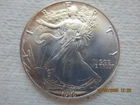 1986 "AMERICAN EAGLE" ONE DOLLAR ONE OUNCE FINE SILVER COIN