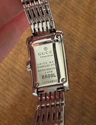 GUCCI WOMAN'S WATCH - 8600L SWISS QUARTZ BLACK DIAL - STAINLESS