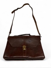 Sophisticated Vintage 1996 leather briefcase brown. used and vintage