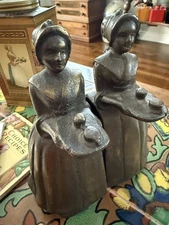VINTAGE CAST IRON ADVERTISING WALTER BAKER CHOCOLATE GIRL DORCHESTER BOOK ENDS 