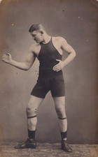RPPC - Handsome Russian wrestler in tight-fitting suit - Gay interest