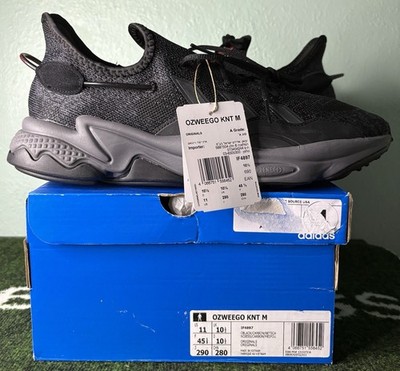 US Men s 11/Women s 12 - Adidas Ozweego Knit  Core Black Carbon  IF4897