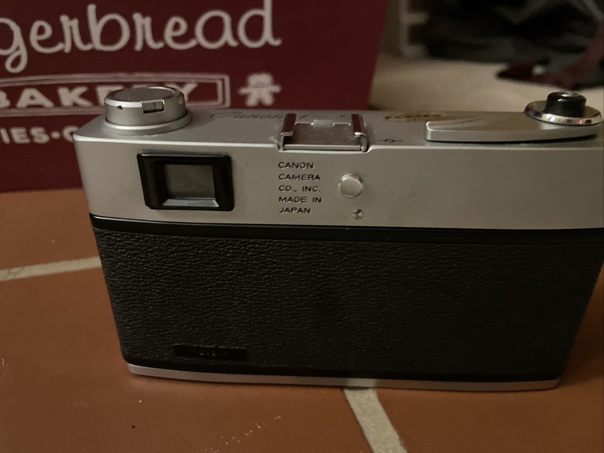 1964 Canon Canonet S 35 mm With Case, Empty Film and Tripod