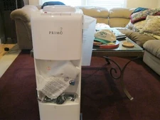 NEW PRIMO HOT AND COLD WATER DISPENSER (IS WARRANTED BY PRIMO)