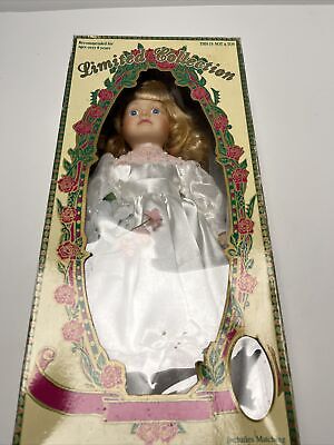 Limited Collection Genuine Porcelain Doll With Matching Limited Collection Genuine Porcelain Doll With Matching