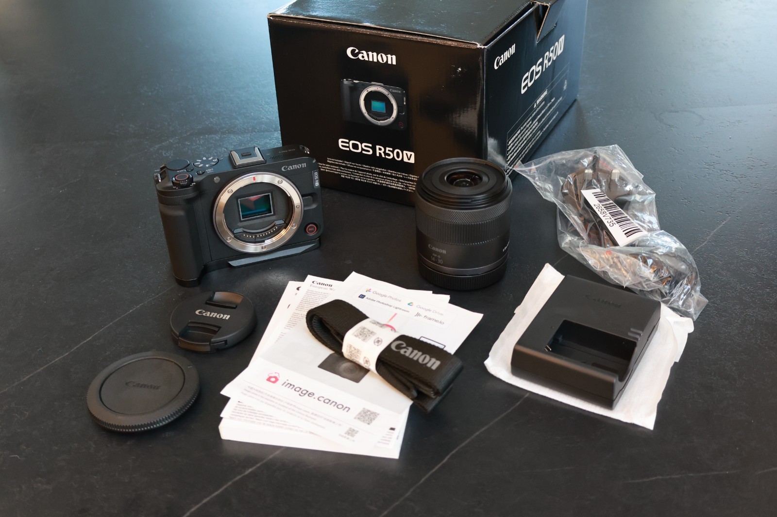 Canon EOS R50 V camera & RF-S 14-30mm IS STM lens kit + grip, charger, battery