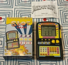 SLOT GAME HANDHELD ELECTRONIC GAME MODEL TS-055 TESTED WORKS