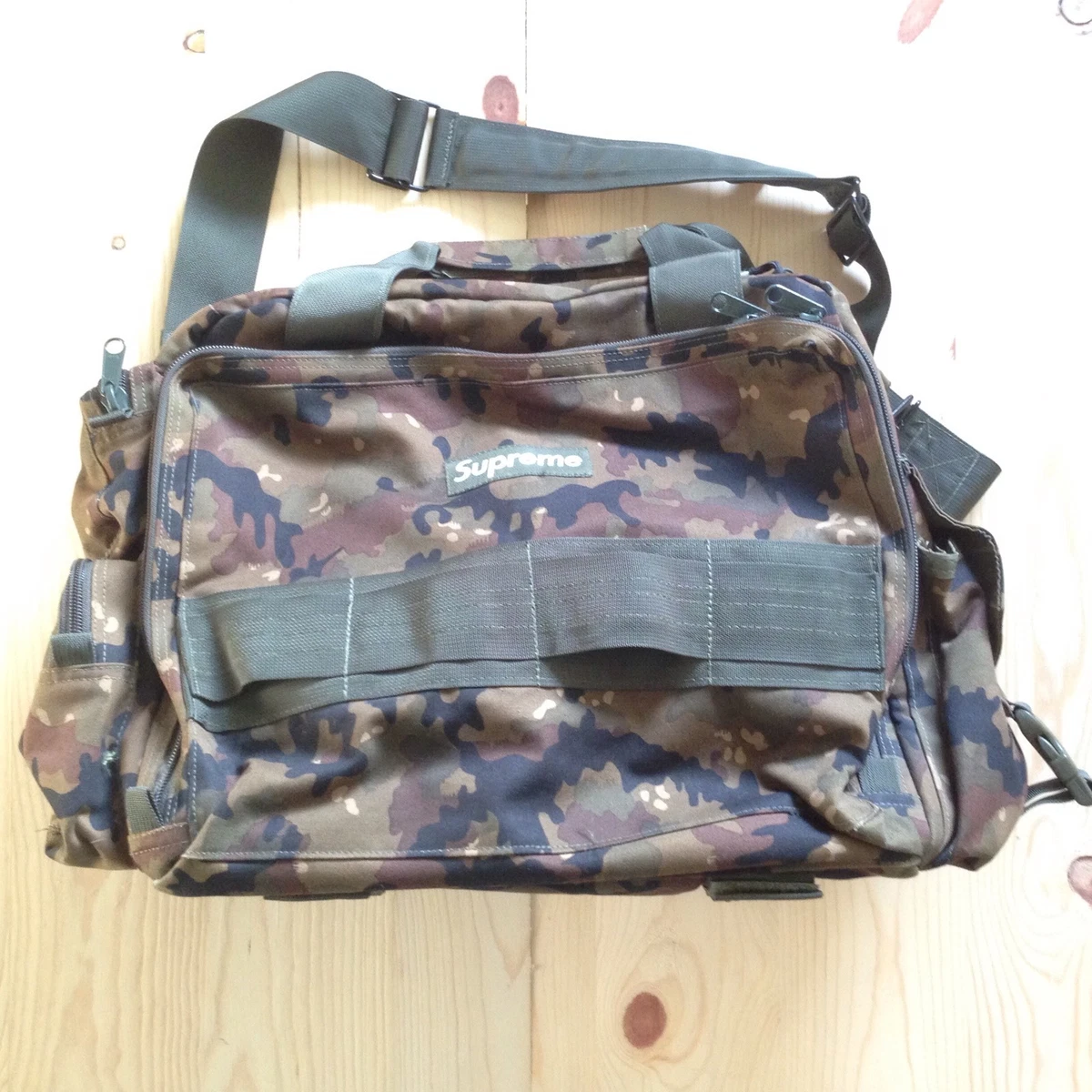 Supreme camo shop duffle bag