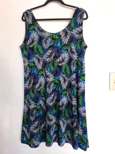 Size L bright colored sleeveless dress in palm tree print. Excellent condition