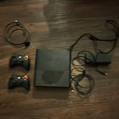 XBox 360 E | Black, 120GB, Includes HDMI, Power, Controllers, and Chargers.