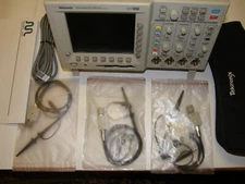 TEKTRONIX TDS3054 OSCILLOSCOPE 500MHZ 5.0 GS w/TDS3TRG TDSFFT PROBES CAL/CERT.