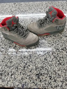 grey and red jordan 5