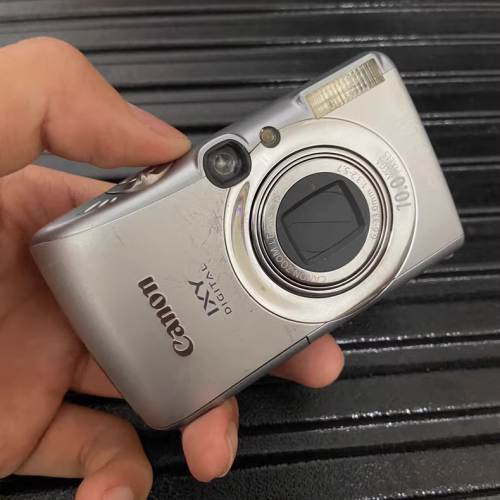 Canon IXUS 970 IS 10MP Camera - 5x Zoom - HD Video - Silver - 90