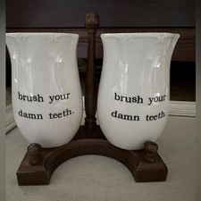 Cream ceramic toothbrush holder with text - rim  detailed edges - set of  