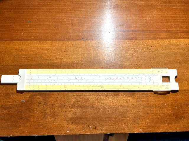 A German-made Aristo slide rule at 13 inches long — a beautifully precise analog relic that doubles as a conversation-starting desk artifact.